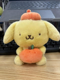 Porte clé peluche 10cm Pompompurin avc fruit SANRIO