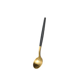 Cuillère doré et manche noir
