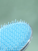 Brosse cheveux démêlante