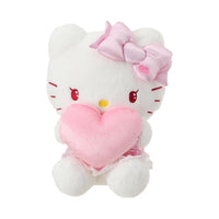Peluche Hello Kitty tenant un coeur 25 cm en position assise Hello Kitty Saint-Valentin Collection