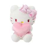 Peluche Hello Kitty tenant un coeur 25 cm en position assise Hello Kitty Saint-Valentin Collection